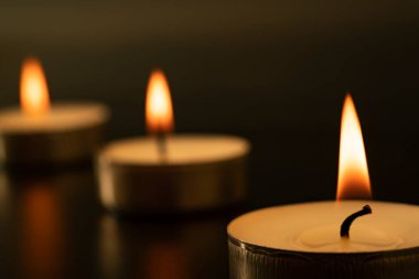 Close-up of burning candlesLots of burning candles on the table. Day of Remembrance