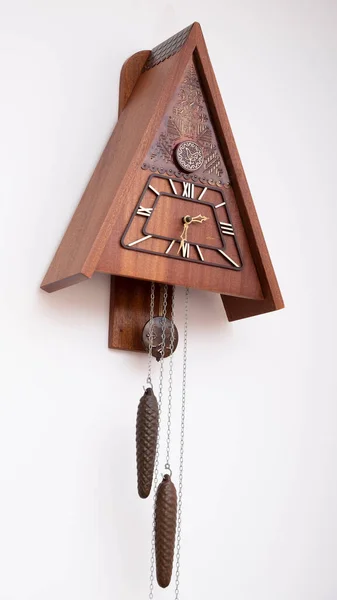 Vintage cuckoo clock isolated for creative background.cuckoo clock hanging on the wall.