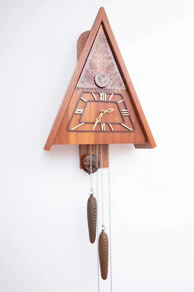 Vintage cuckoo clock isolated for creative background.cuckoo clock hanging on the wall.