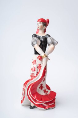 A traditional figurine of a flamenco dancer for home decoration, formerly often found in Spanish homes. Sold in a street stall at the Madrid Flea Market.