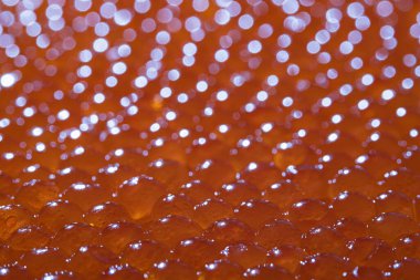 Texture photo of red caviar close up