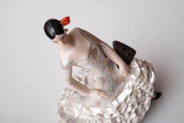 Spanish handmade souvenirs, figurines of flamenco dancers on a white background