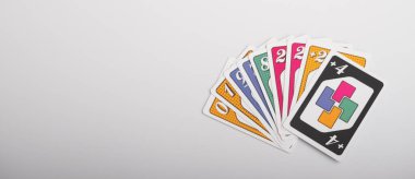 Lviv, Ukraine 24.02.2023new Uno card game and cards on white background. fun pastime