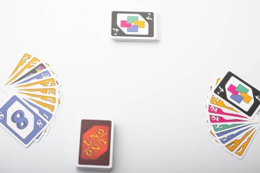 Lviv, Ukraine 24.02.2023new Uno card game and cards on white background. fun pastime