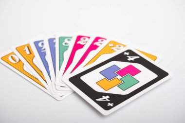 Lviv, Ukraine 24.02.2023new Uno card game and cards on white background. fun pastime