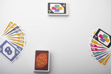 Lviv, Ukraine 24.02.2023new Uno card game and cards on white background. fun pastime