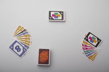 Lviv, Ukraine 24.02.2023new Uno card game and cards on white background. fun pastime