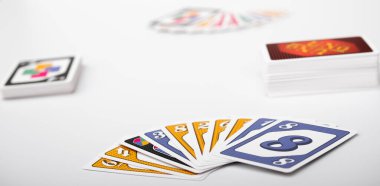 Lviv, Ukraine 24.02.2023new Uno card game and cards on white background. fun pastime