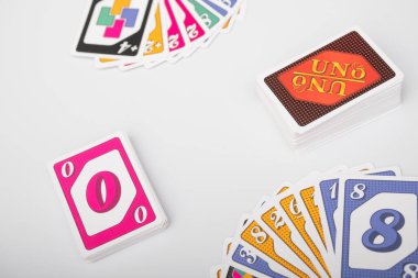 Lviv, Ukraine 24.02.2023new Uno card game and cards on white background. fun pastime