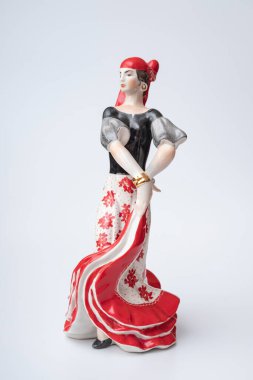 A traditional figurine of a flamenco dancer for home decoration, formerly often found in Spanish homes. Sold in a street stall at the Madrid Flea Market.
