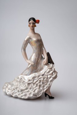 Spanish handmade souvenirs, figurines of flamenco dancers on a white background