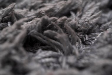 Gri halılar ve kalın kazıklar. makro