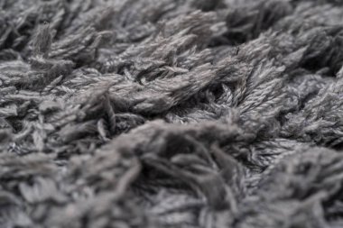 Gri yün, makro pamuk, gri doğal koyun yünü, doku, koyu halı, yakın plan, gri yün.,