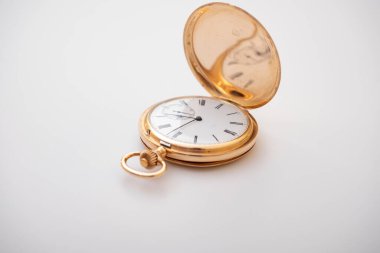 vintage gold pocket watch longines isolated on white background