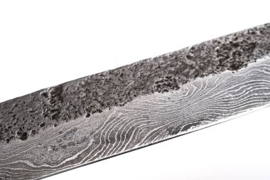 Şam çeliği desenli bir arka plan. Damascusknife dokusunun makro görüntüsü. Orijinal desenli Şam çeliği. Şam çelik deseni.