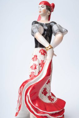 A traditional figurine of a flamenco dancer for home decoration, formerly often found in Spanish homes. Sold in a street stall at the Madrid Flea Market.