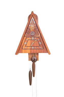 Vintage cuckoo clock isolated for creative background.cuckoo clock hanging on the wall.