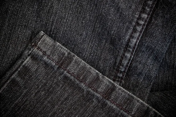 青いジーンズのクローズアップビュー クールな鮮やかな色で伝統的なビジネスの背景のためのデニムテクスチャ — ストック写真