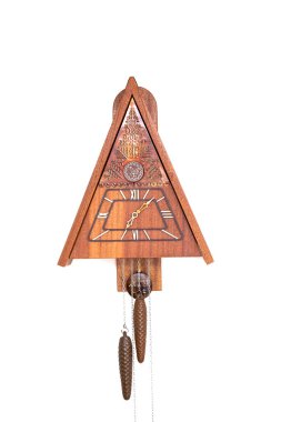 Vintage cuckoo clock isolated for creative background.cuckoo clock hanging on the wall.