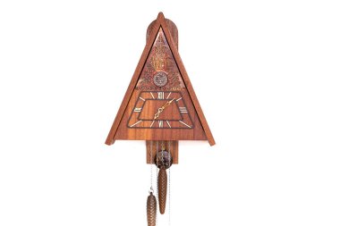Vintage cuckoo clock isolated for creative background.cuckoo clock hanging on the wall.