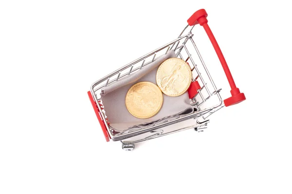 Troli Belanja Atas Roda Dengan Koin Emas Dan Dolar Kertas — Stok Foto