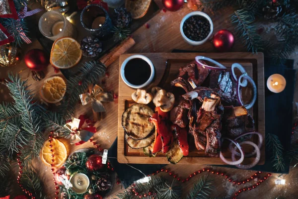 fresh grill rib meat with bones and pepper, marrow, onion, new year table