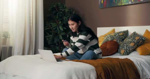 Concept Online Shopping Paying Card Young Girl Buys Dream Products — Video