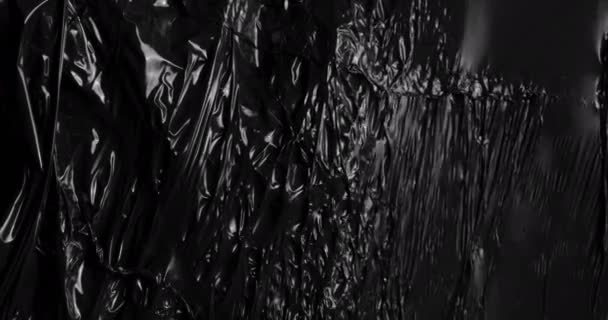 Захоплююча Текстура Натягнута Пластикова Плівка Темному Тлі Захоплює Органічну Тактильну — стокове відео