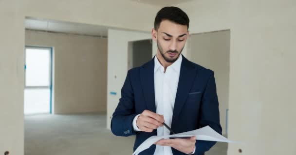 Portrait Successful Young Man Smart Elegant Suit Holding Plan Building — Stock Video