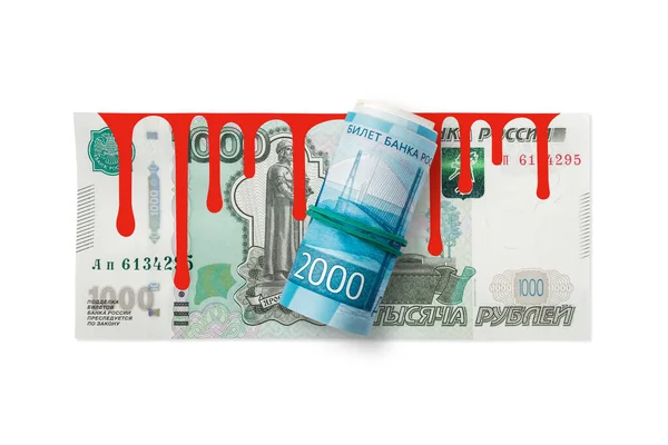 Russian rubles on a white background with blood. Business companies leave Russia. Rouble is the currency of the Russian Federation.