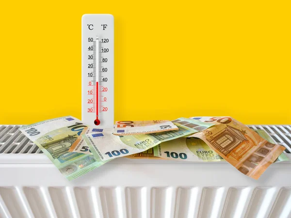 Euro banknotes on home heating radiator with thermometer. Energy crisis and expensive heating costs for winter season. Big heating and gas bill. Thermometer shows plus 4 degrees warm