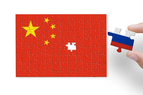 stock image Puzzle made from China and Russia flags. Sanctions and embargo for Russian war and aggression in Ukraine