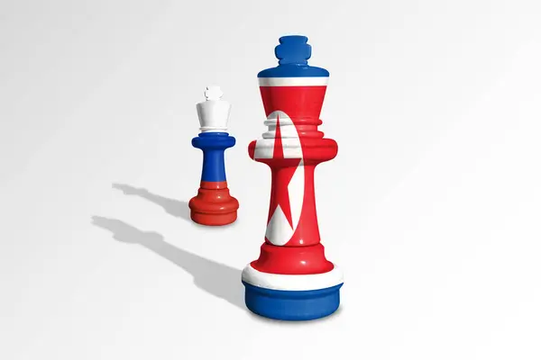 stock image Chess made from flags of Russia and North Korea. Russia and North Korea relations and military collaboration