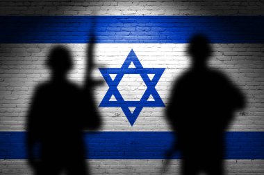 Tuğla duvara gölgeli İsrail bayrağı çizilmiş. Gazze ve İsrail çatışması. Terörist örgütler hezbollah ve hamas