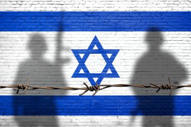 Tuğla duvara gölgeli İsrail bayrağı çizilmiş. Gazze ve İsrail çatışması. Terörist örgütler hezbollah ve hamas