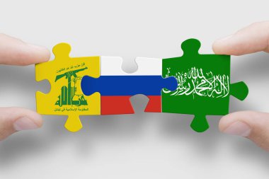 Hizbullah adlı terör örgütünün bayraklarından yapılmış bir bulmaca, Hamas. Rusya ilişkileri ve Hamas ile işbirliği