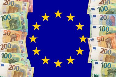 Avrupa Birliği bayraklarıyla ilgili Avro notları. EUR, Avrupa Birliği 'nin resmi para birimidir.