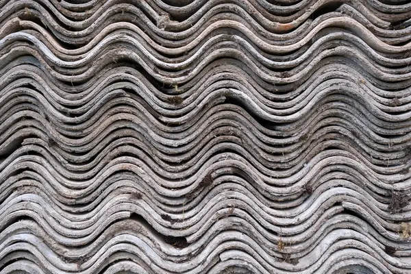 Stock image Old and very dangerous asbestos roof. Asbestos dust in the environment. Health problems