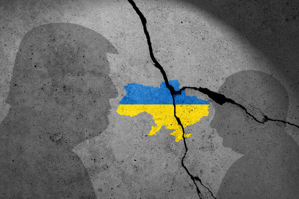 Flag of Ukraine painted on cracked wall 