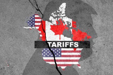 Beton duvara TARIFFS sözcüğüyle Kanada ve ABD bayrakları çizilmiş. Görev, ticaret, gümrük ve gümrük vergileri savaşı