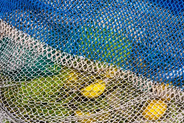 Lots of colorful fishing nets left in the port. Port de Soler, Mallorca, Spain