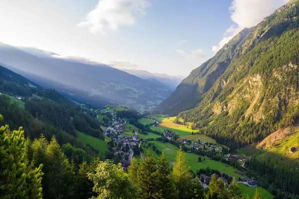 stock image Beautiful village of Heiligenblut, Austria. Aerial view of famous tourist attraction in East Tyrol region of Alps. Grossglockner mountain landscape with high snow capped peaks