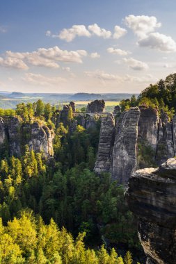 Picturesque panorama from famous Bastai Bridge in Saxon Switzerland Germany on sunny day. clipart