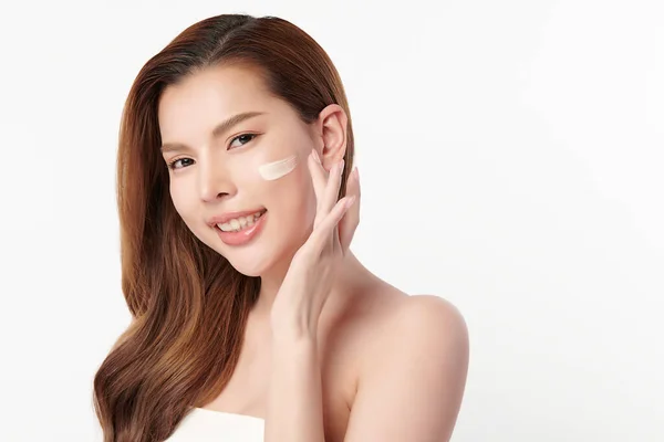 Beautiful Young Asian Woman Smiling Applying Face Cream White Background — Stock Photo, Image