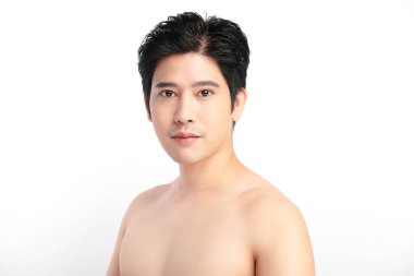 handsome young asian man on white background, Face care, Facial treatment, Cosmetology, beauty and spa, Asian men portrait. clipart