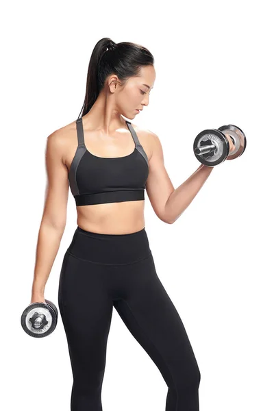 Asian Woman Working Out Dumbbells Wearing Sport Exercise Suit White Royalty Free Stock Images