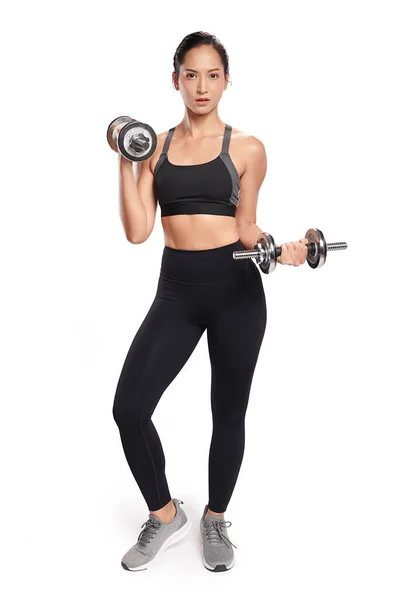Asian Woman Working Out Dumbbells Wearing Sport Exercise Suit White Royalty Free Stock Photos