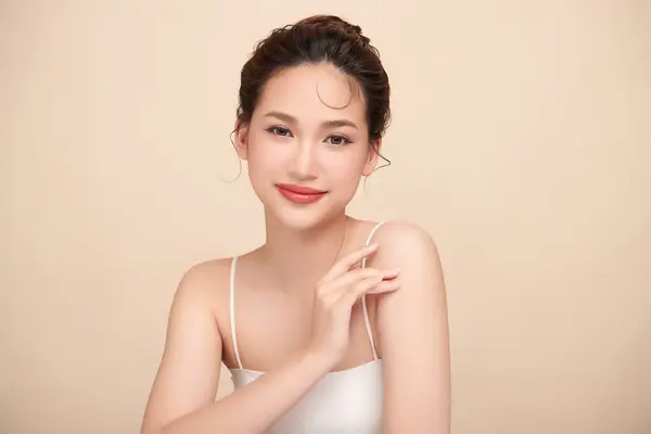 Beautiful Young Asian Woman Clean Fresh Skin Beige Background Face Stock Photo