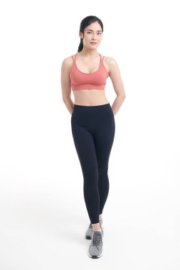 Beyaz arka planda spor kıyafetleri, spor kıyafetleri, spor kıyafetleri, yoga kıyafetleri, sağlıklı yaşam tarzı, spora hazır Asyalı güzel bir kadın..
