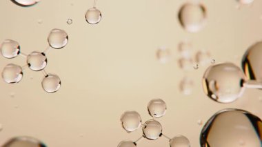 Sağlık kavramı, hareket kamerası yakınlaşması. Bilim ve güzellik. Açık kahverengi sarı arka planda 3 boyutlu Altın Kolajen Deri Serumu ve Vitamin izole edilmiş. Cilt bakımı kozmetik çözeltisi. 3d hazırlayıcı